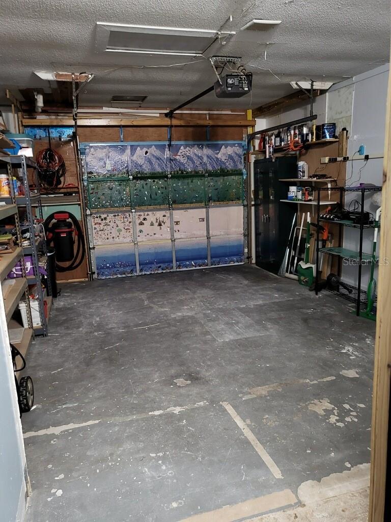 Great garage space with side entrance from back yard.