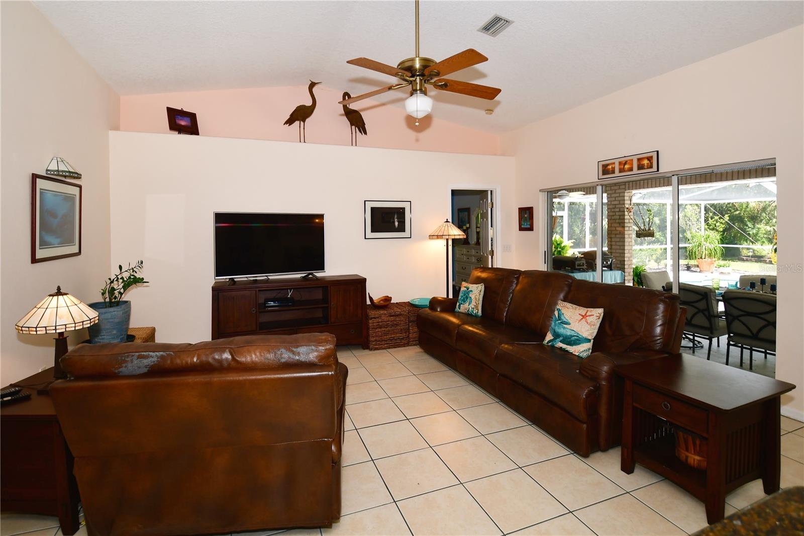 Open Living Room with Sliders to the Pool