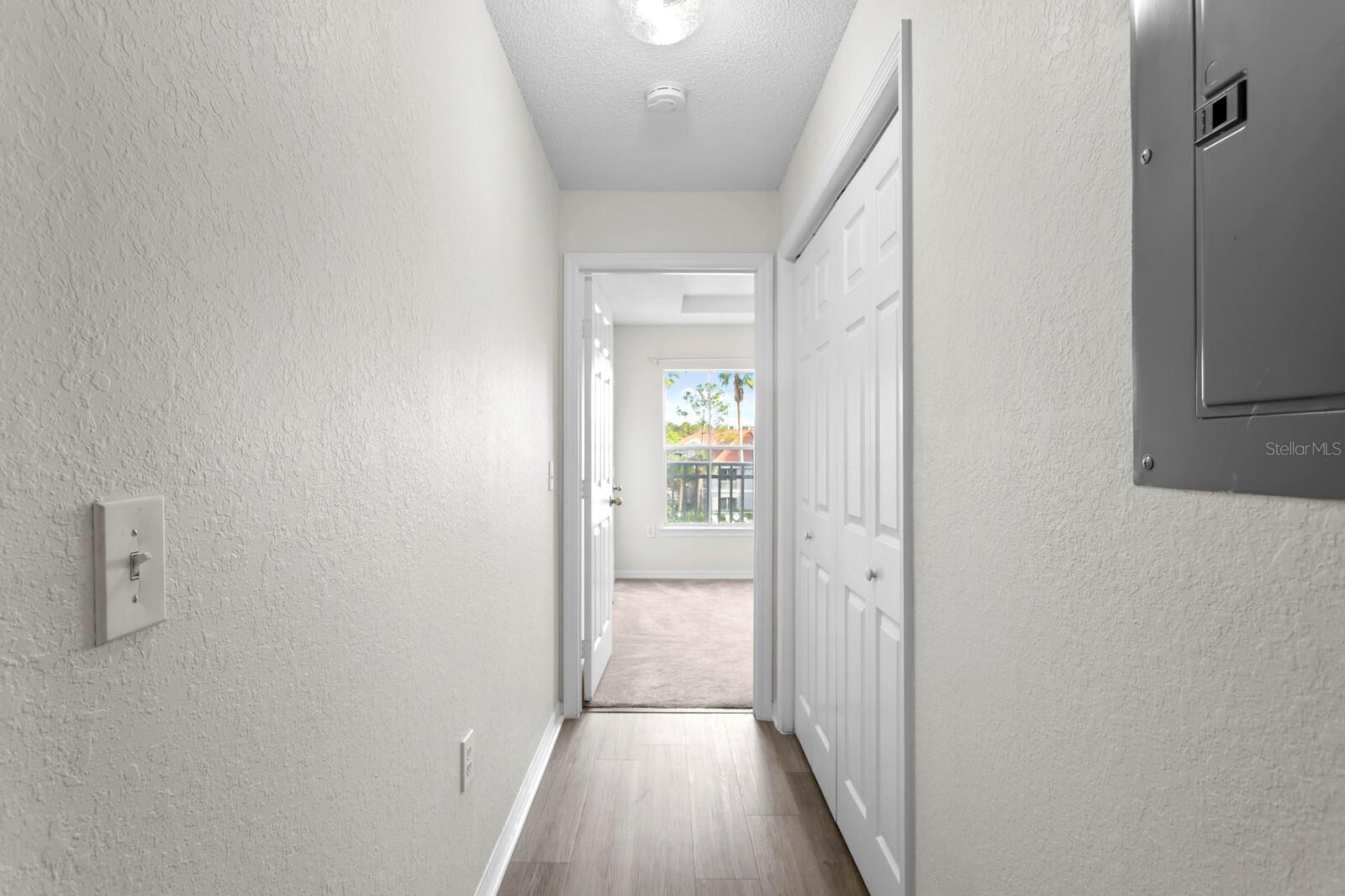 Hallway down to the laundry room and 2nd bedroom