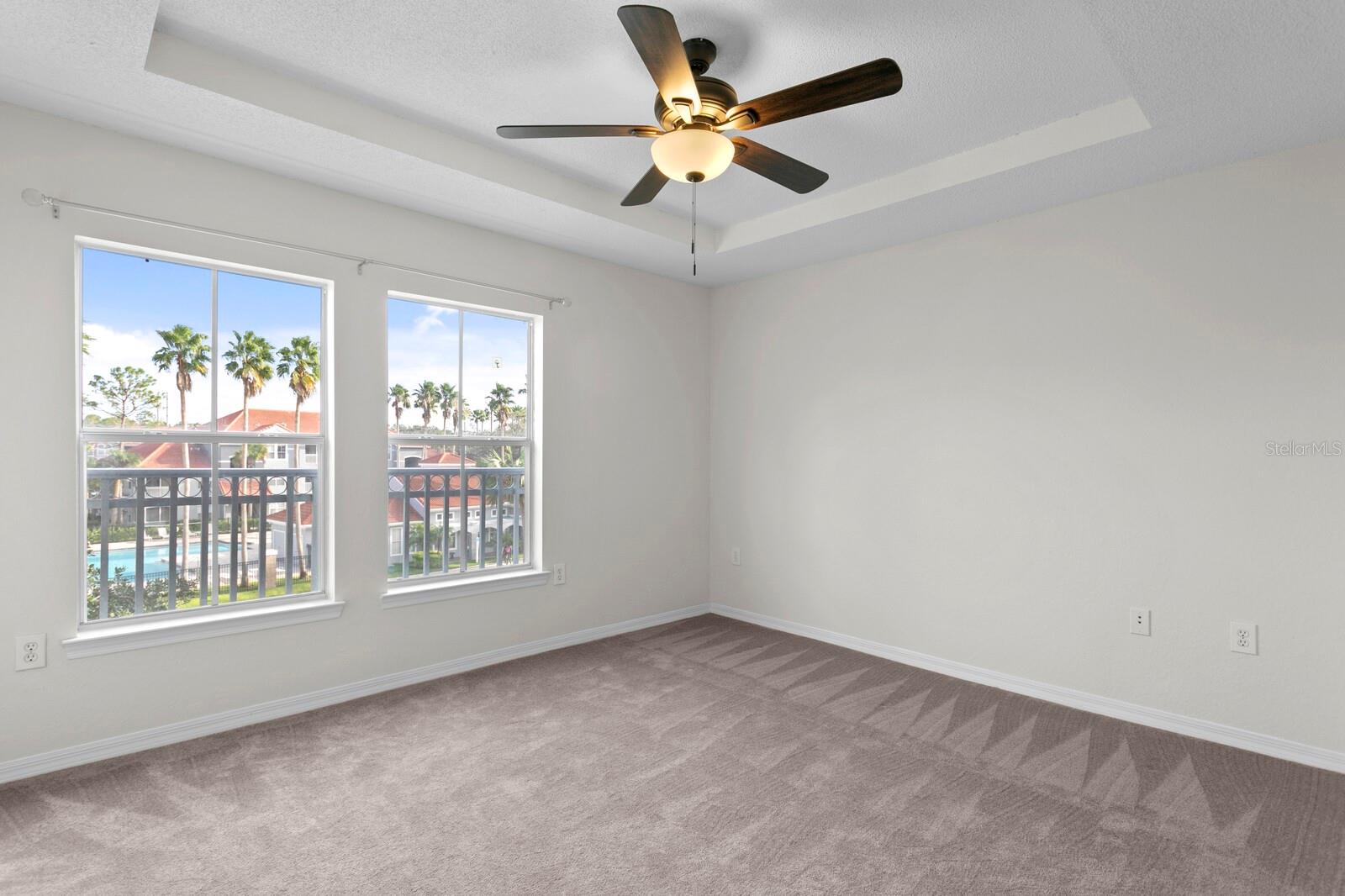 Spacious 2nd bedroom with a new ceiling fan