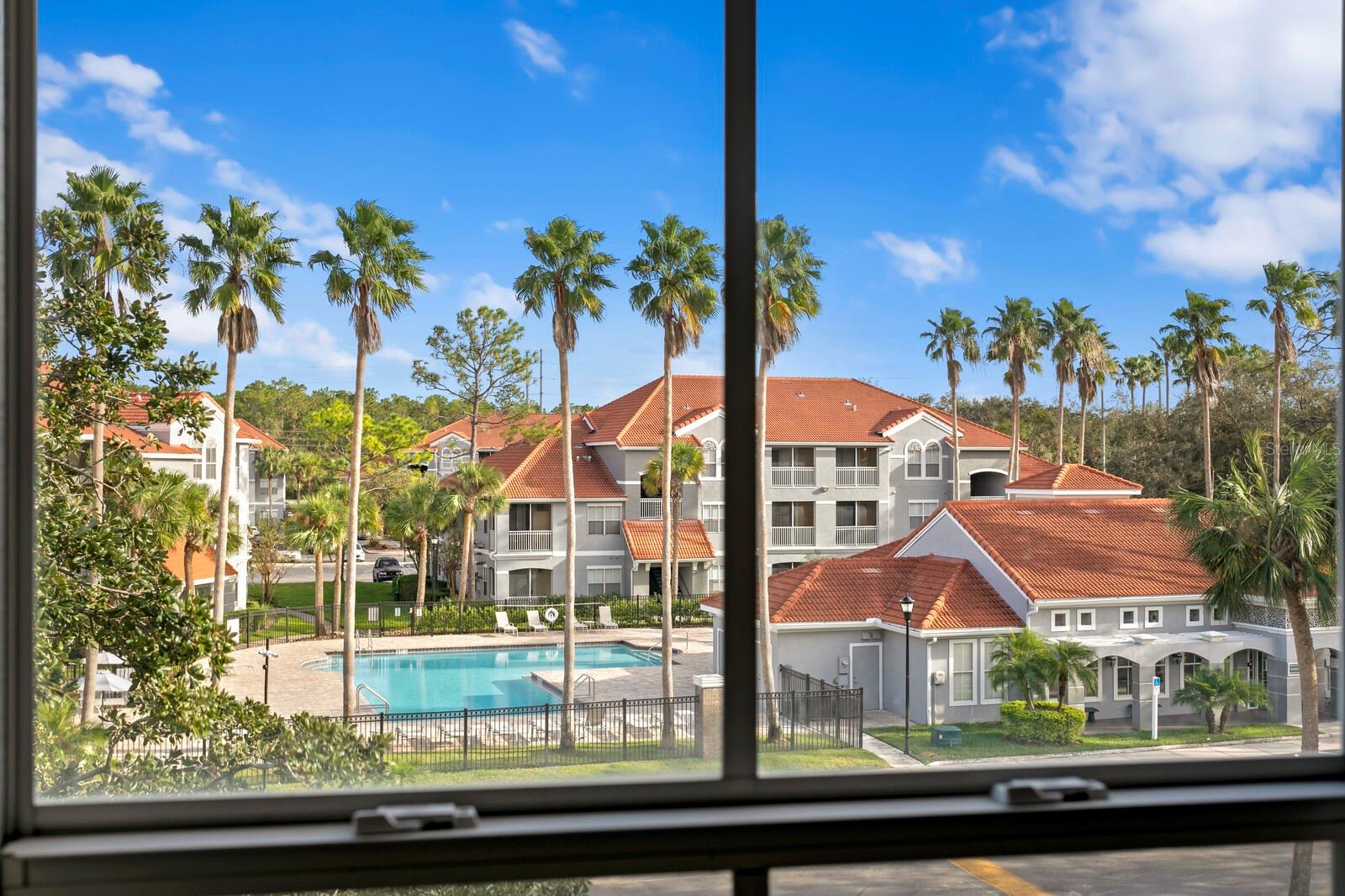 Community pool views from the 2nd bedroom