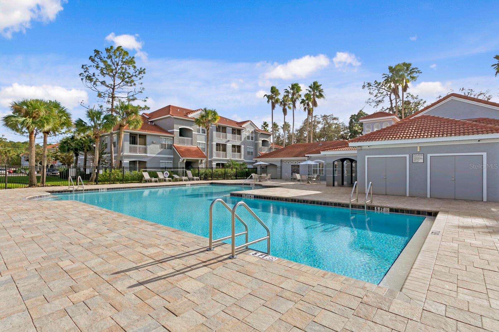 Enjoy cooling off in the spacious community swimming pool