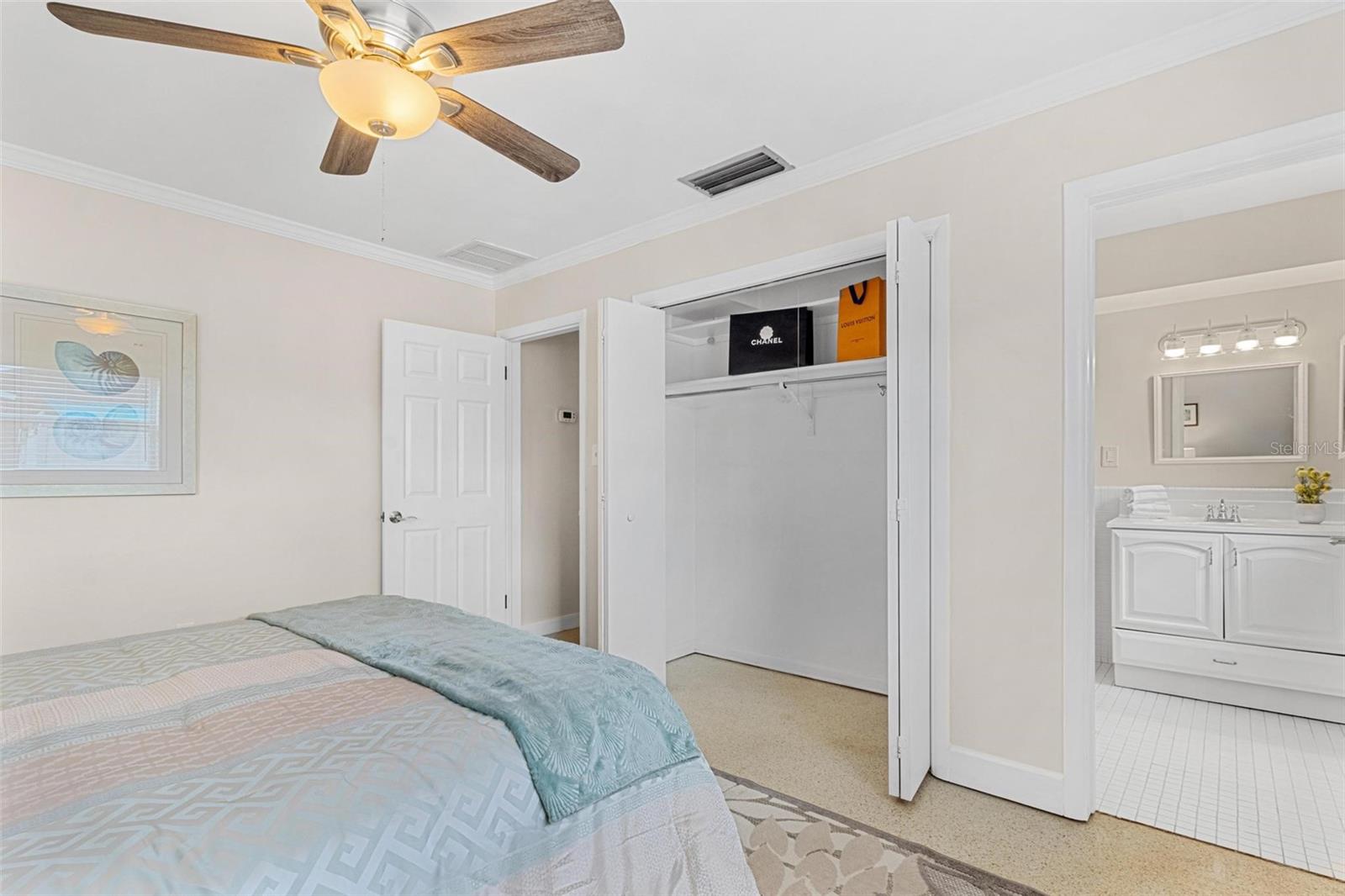 Primary bedroom with ensuite bathroom