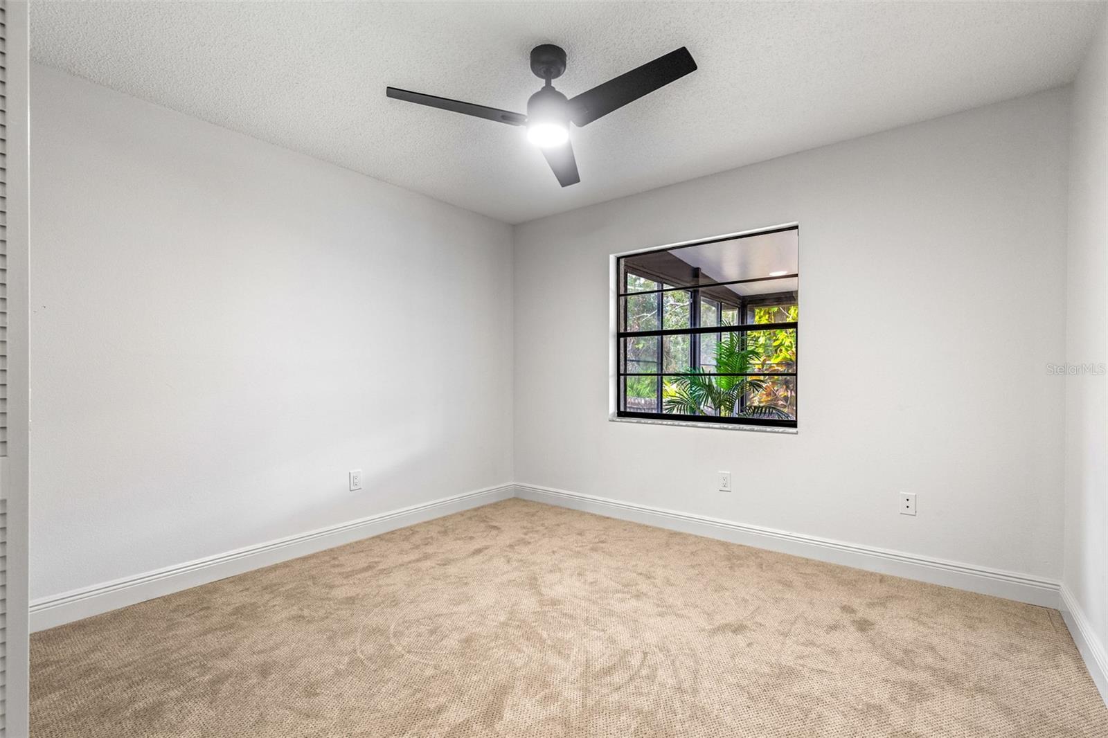 Guest bedroom #2 with luxury pattern carpet