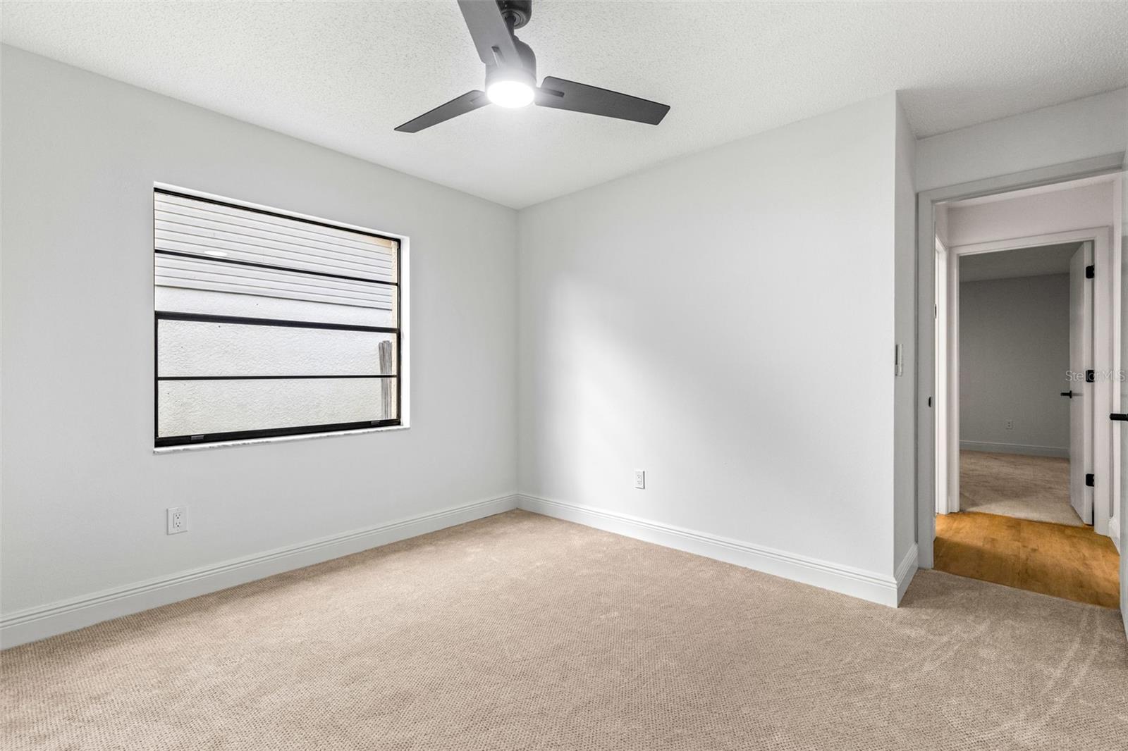 Guest bedroom #3 with luxury pattern carpet