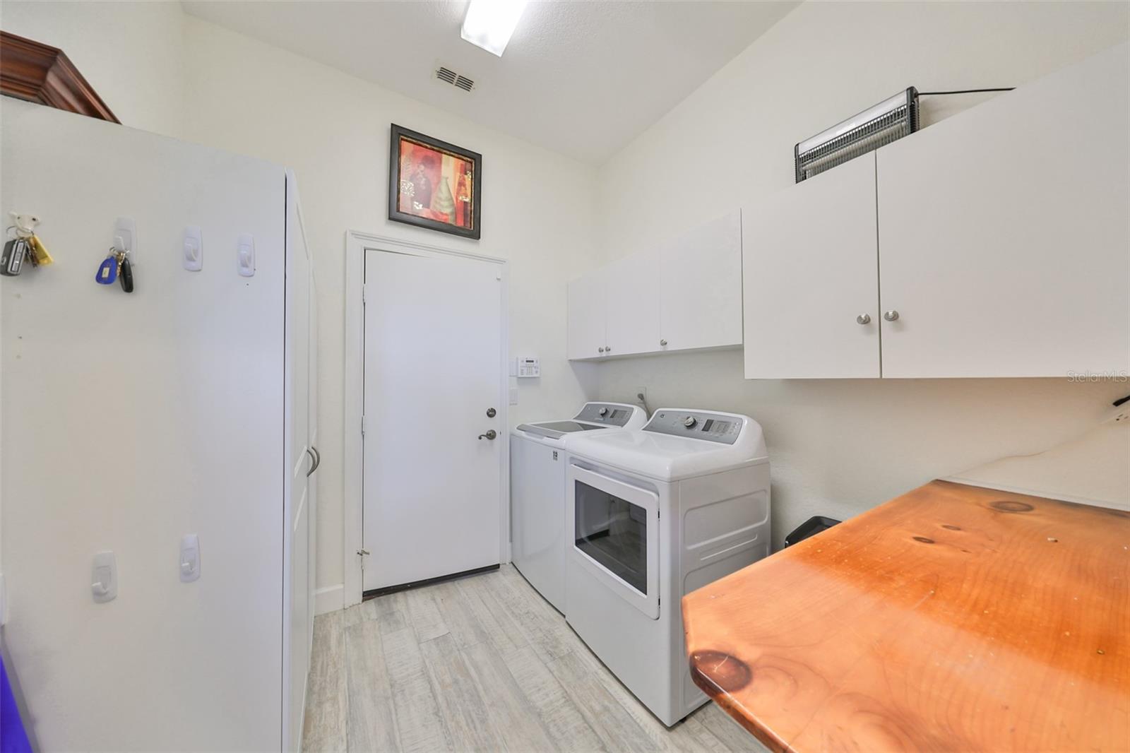 Laundry Room  w/ Storage Cabinets