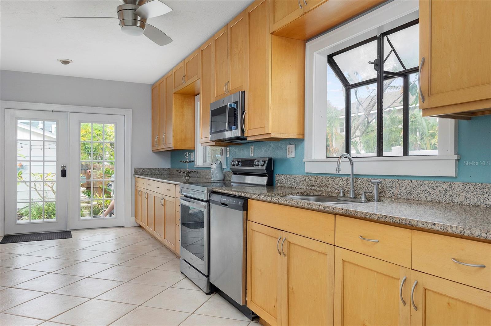 Large kitchen with granite counter tops