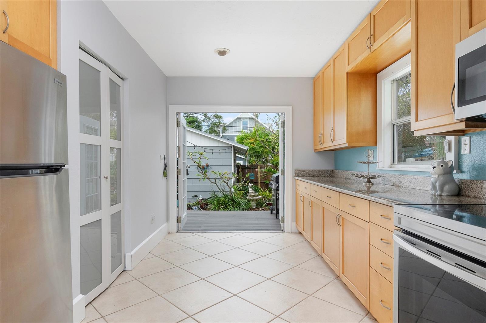 French doors lead to the backyard deck