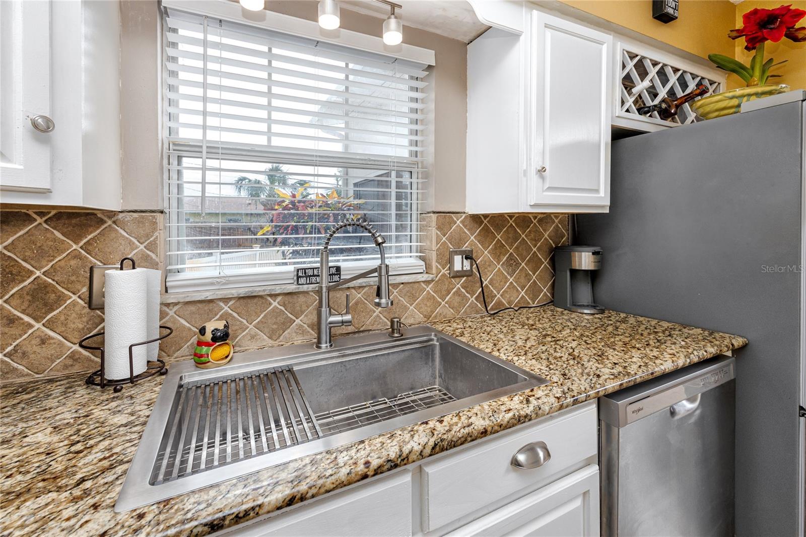 Beautiful new sink with built in drying rack.