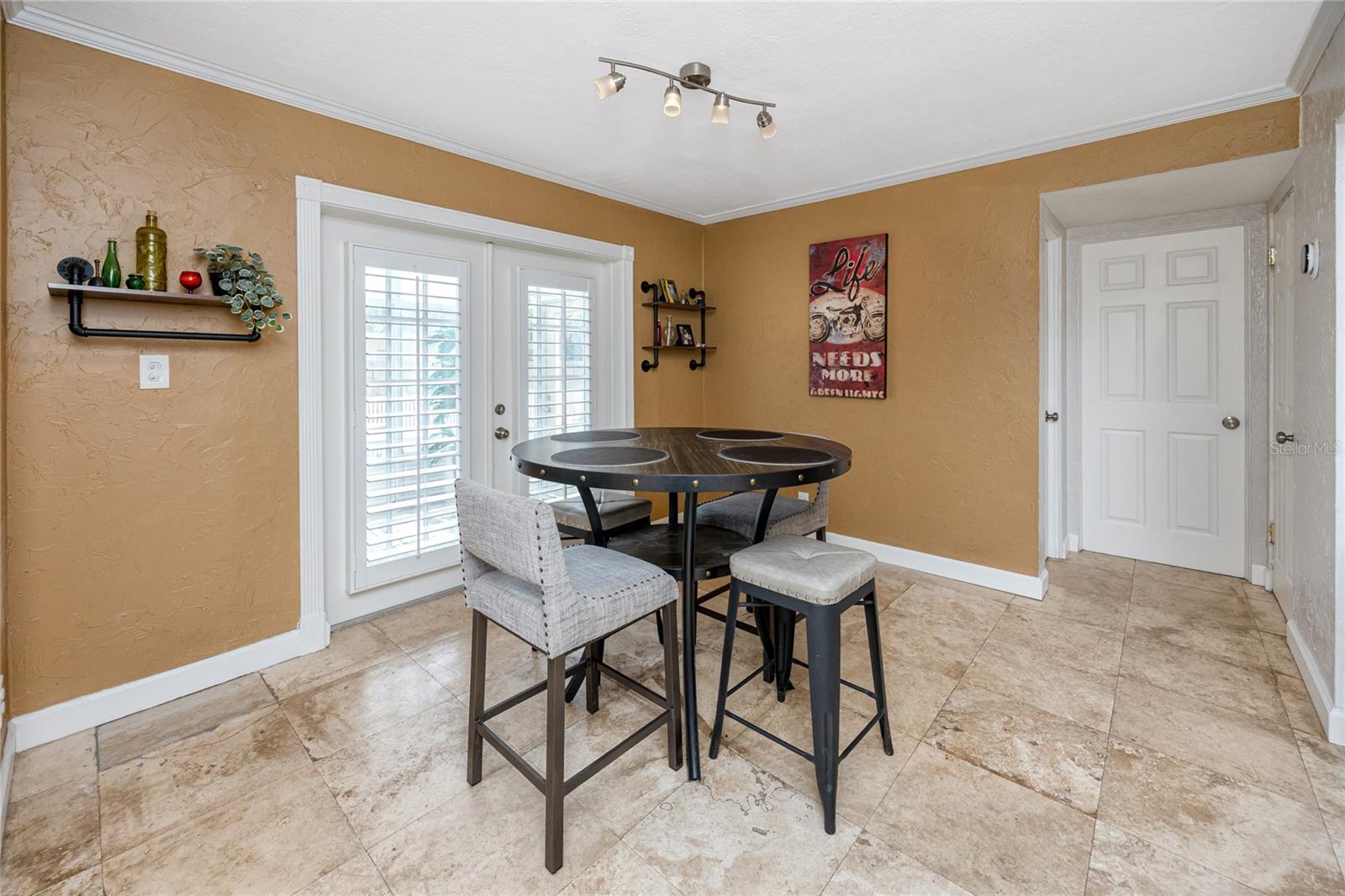 Dining Room with French Doors leading to the Sunroom