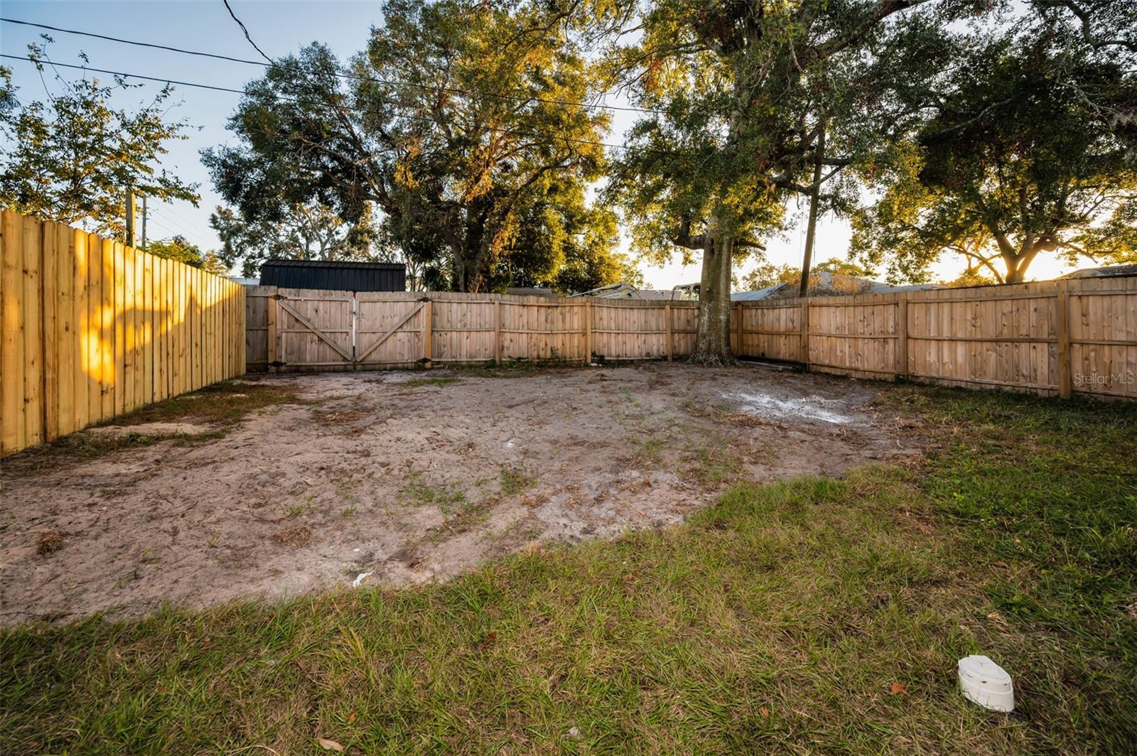 Backyard w/ double gated alley access!