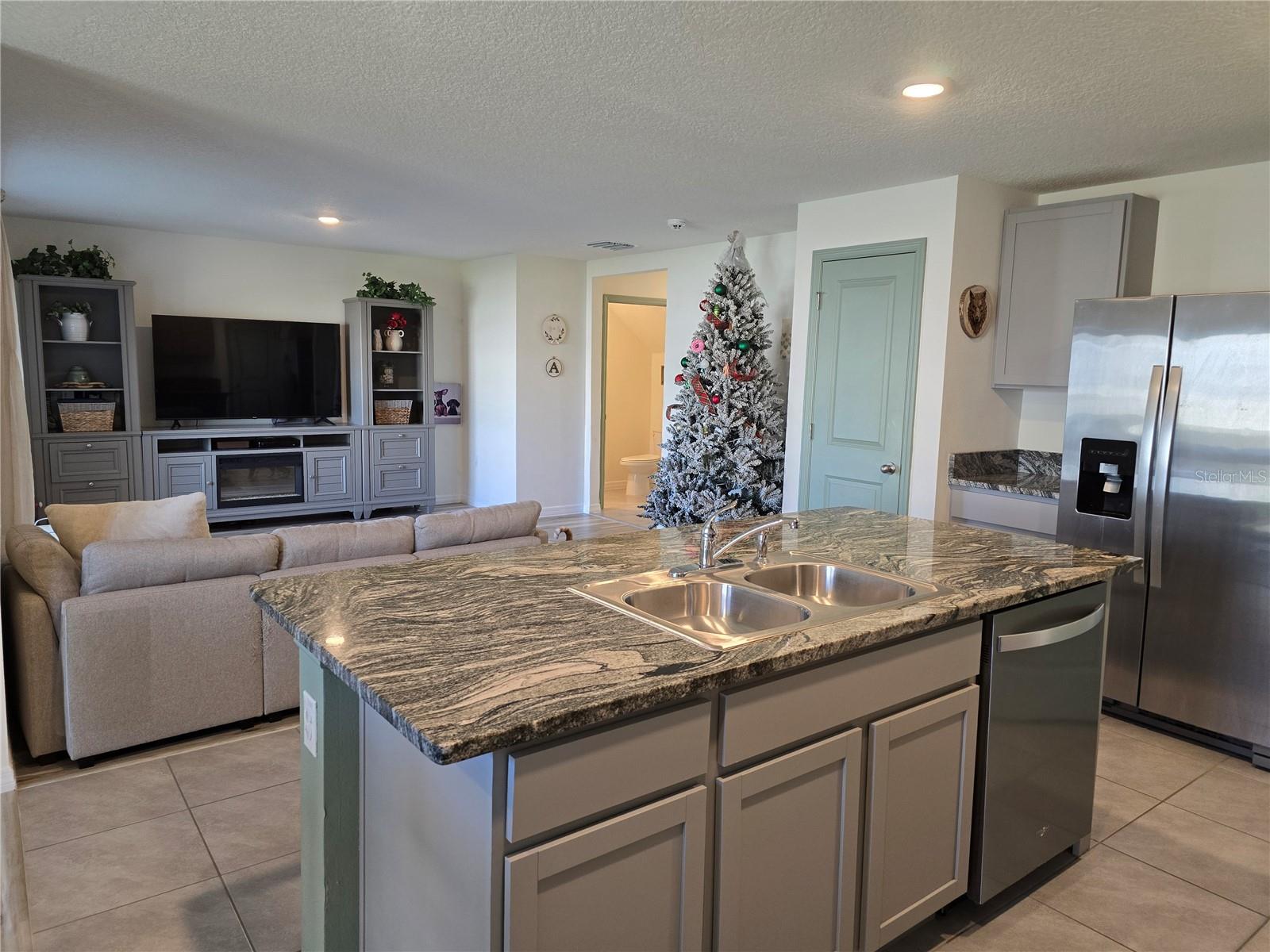 Kitchen opens to Living Room