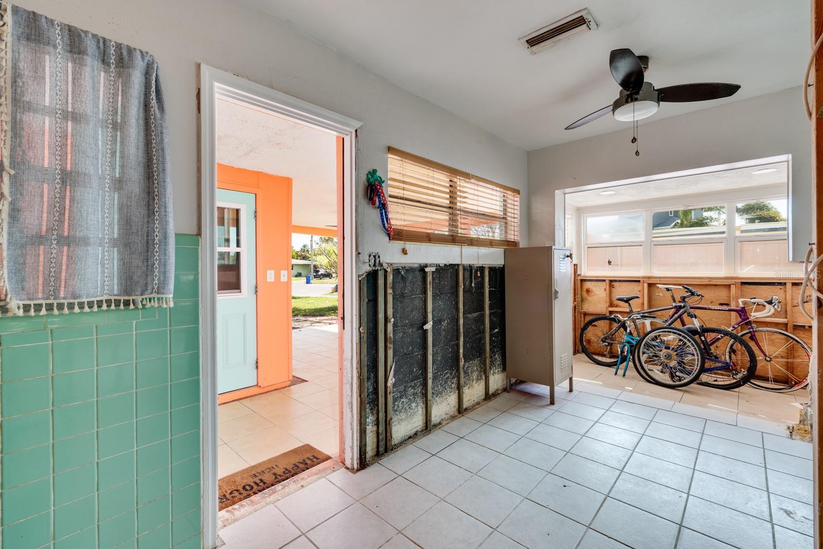 Front entrance, dining room and "office".