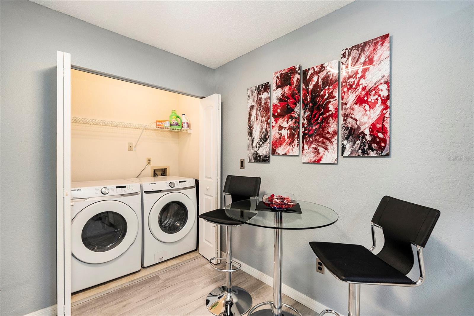 The dinette area includes a convenient laundry room with a new Samsung washer and dryer.