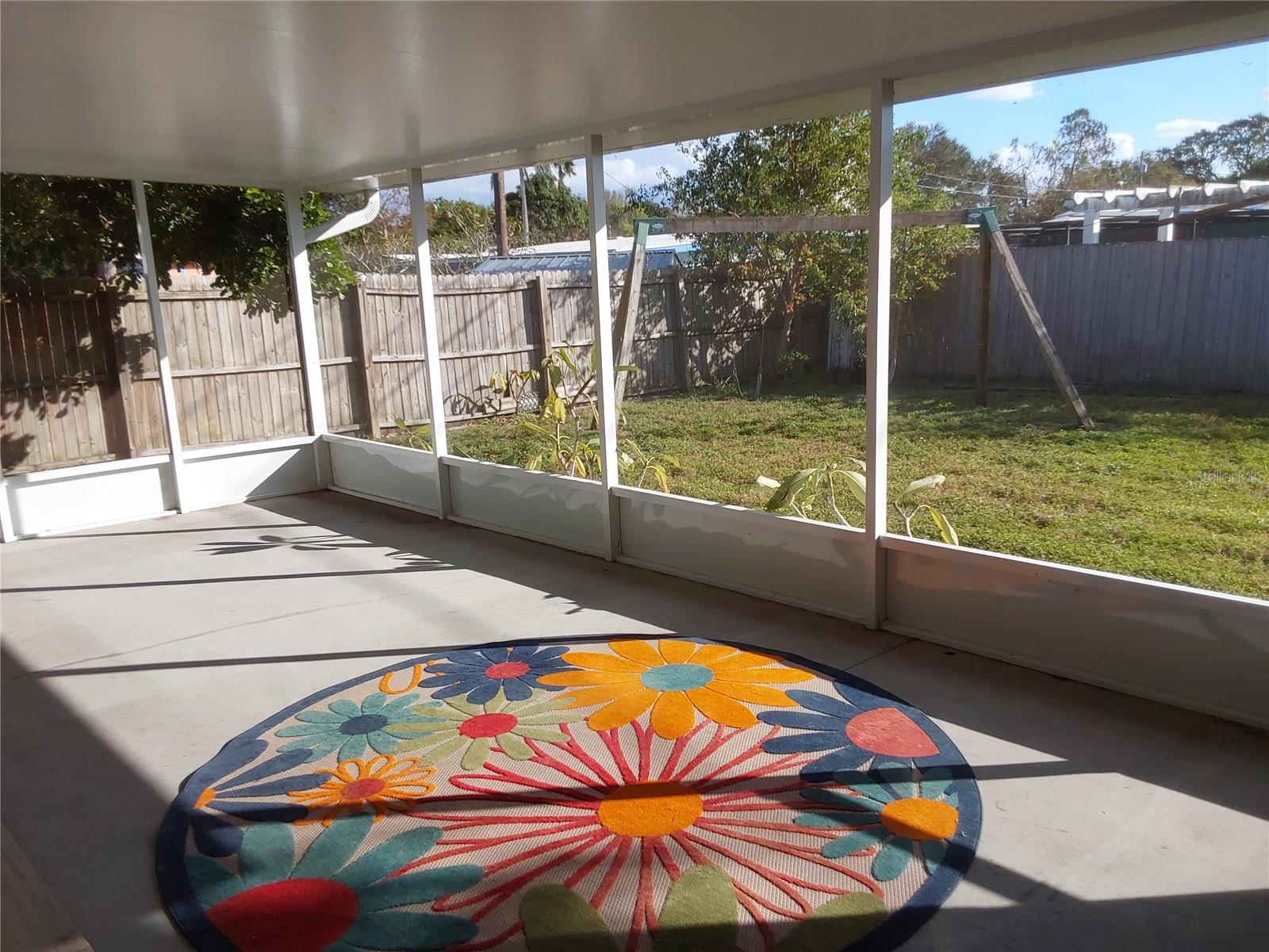 Large covered screened in back Patio