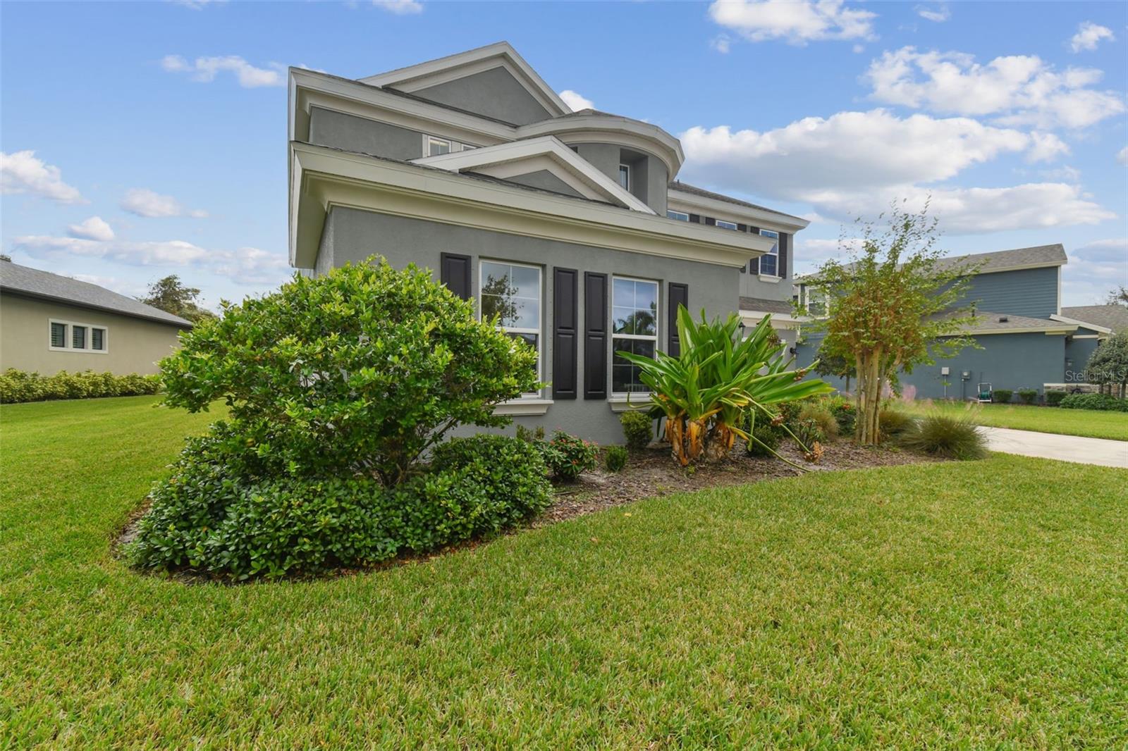 Front Exterior w/Beautiful Landscaping