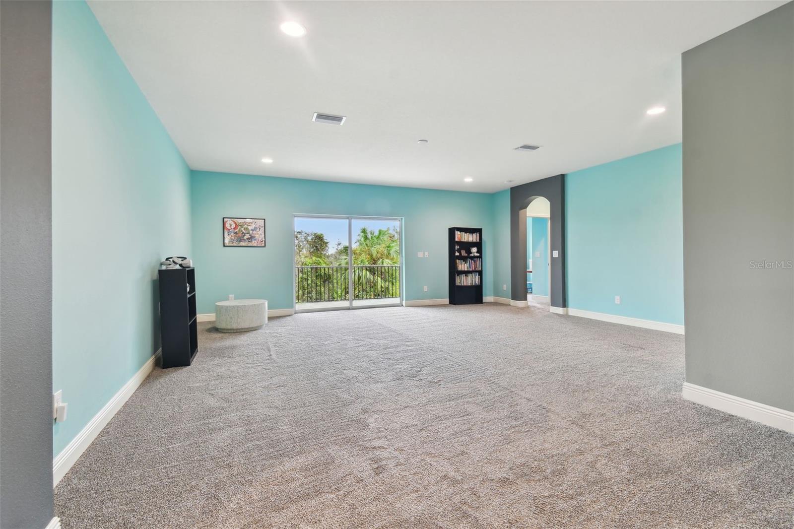 HUGE Bonus Room w/Access to oversized Balcony