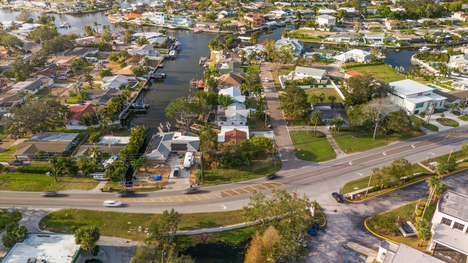 Home is on the right. Show the short canal toward homes in Harbor Oaks on the water.