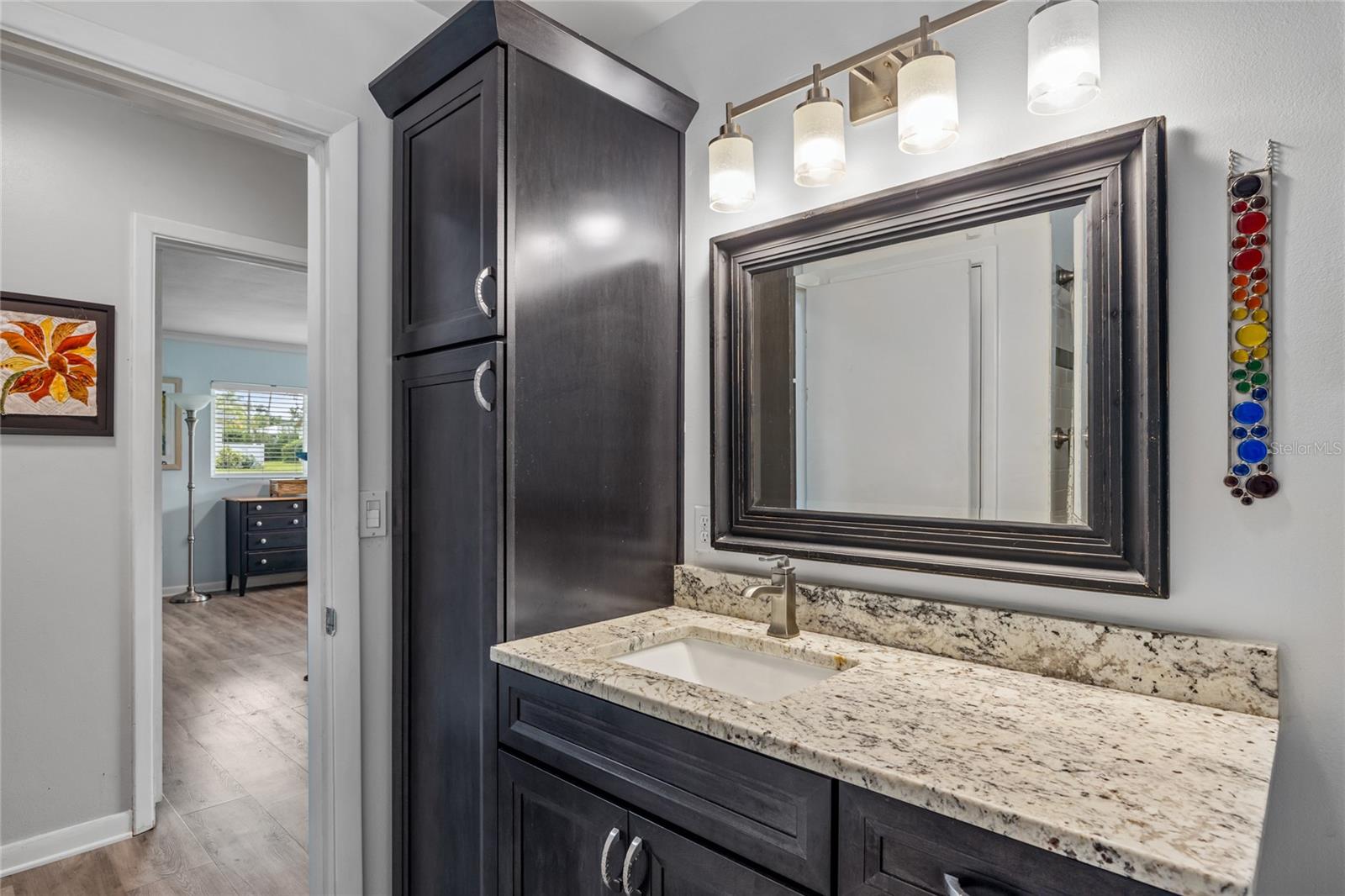 Alternate view in the Guest Bathroom showing additional tower storage.