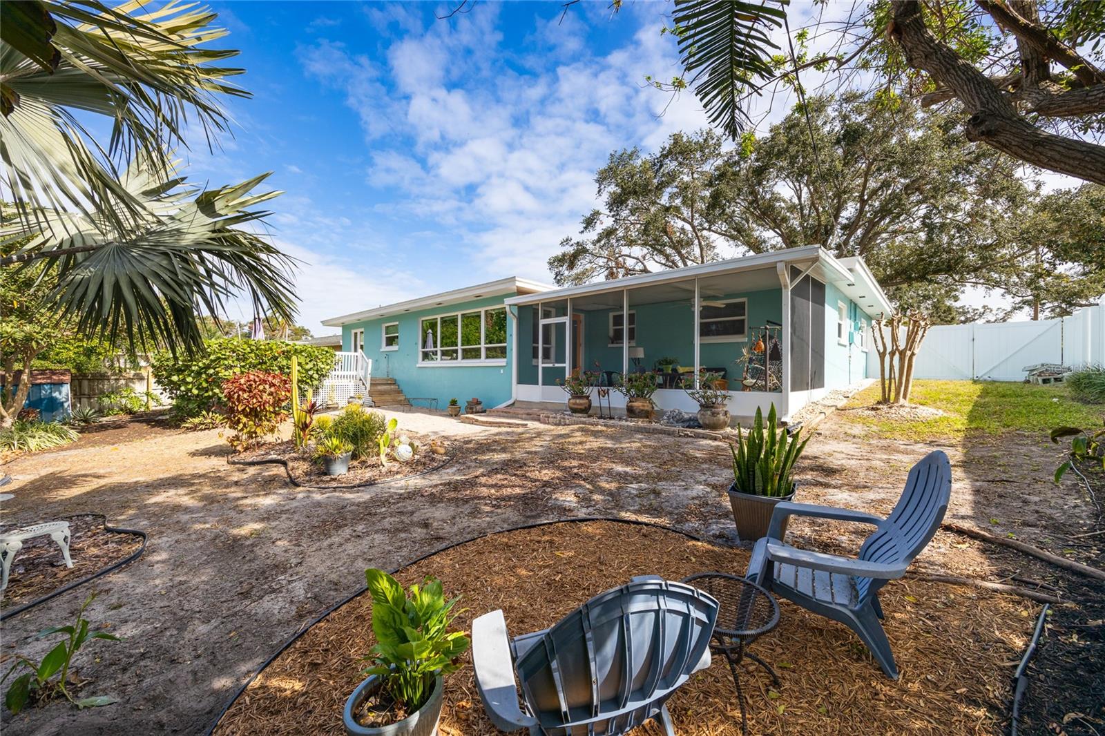 The back yard has many landscaped planter beds and also room to add a pool if you wish!   The side yard is wide enough that you might be able to park a small boat or small RV as well!