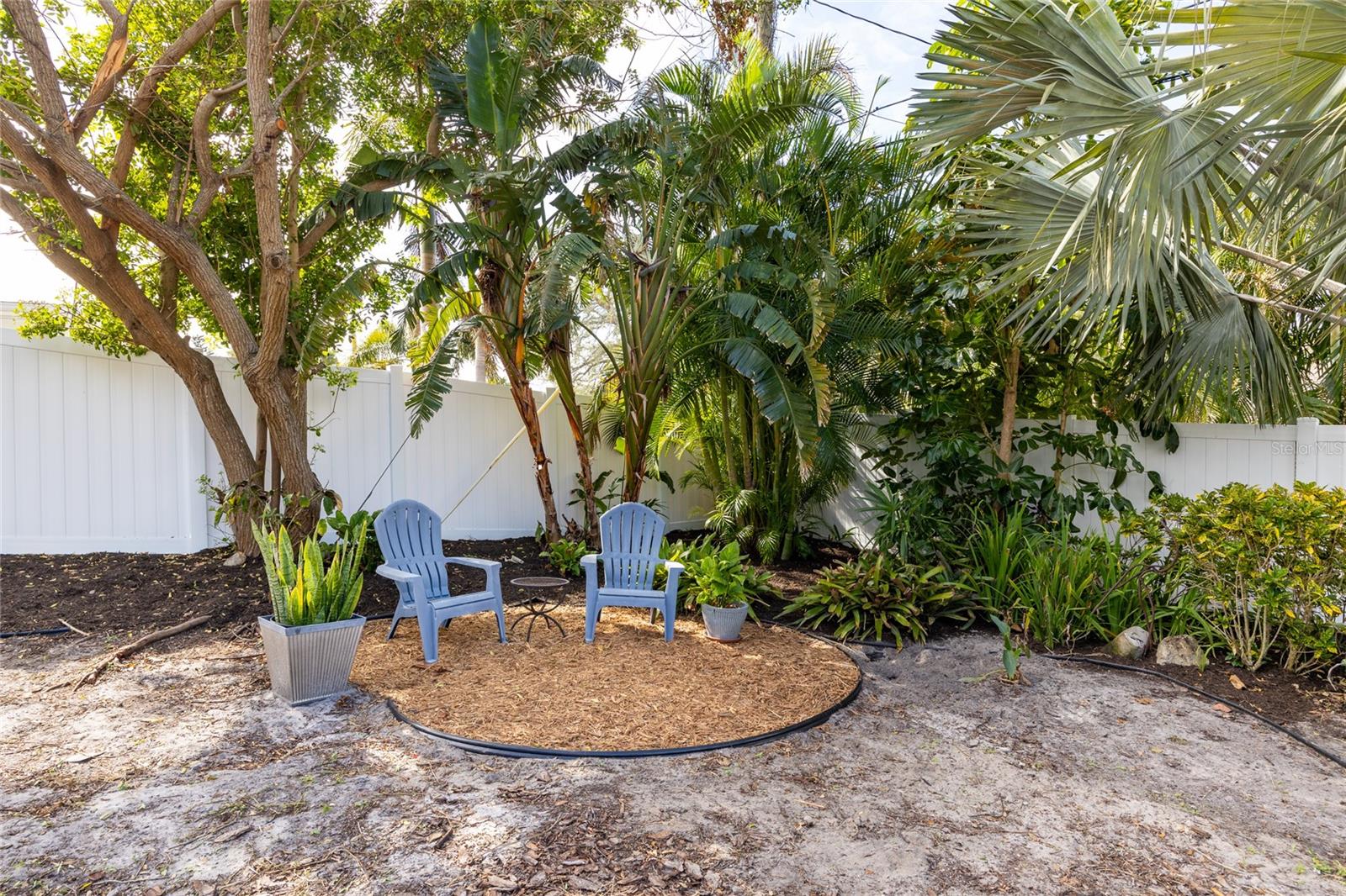 Another sitting area where maybe you'd put a firepit for those cooler winter nights!