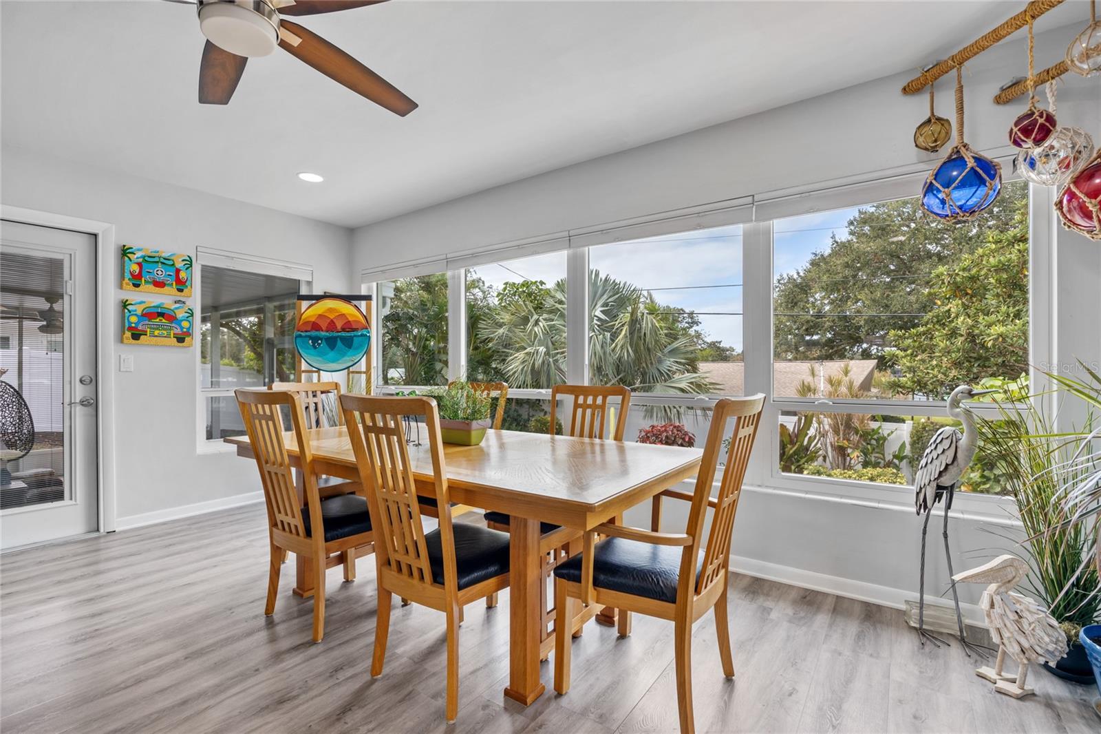 This Dining Room with its massive windows will be the perfect place to enjoy meals with a view of the back yard and also a peak view down to Lake Saundra!