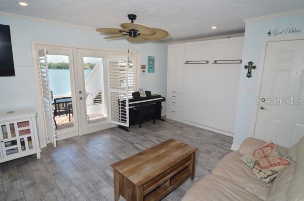 Beautiful doors out onto the patio with privacy shutters