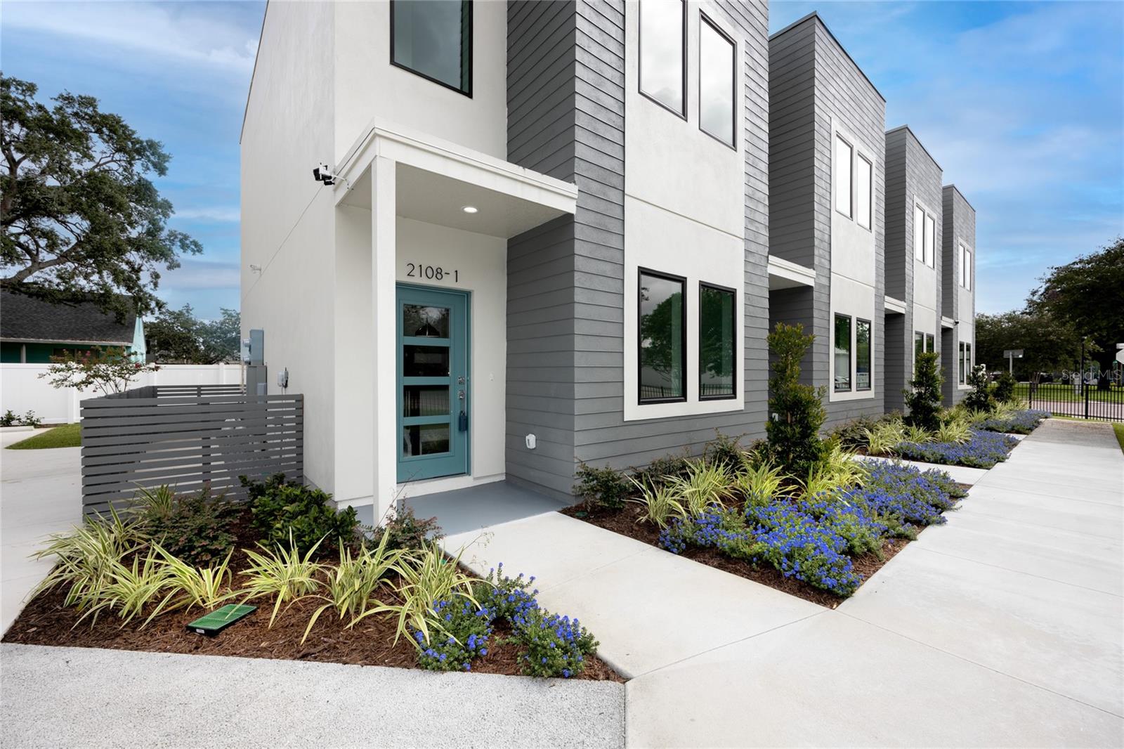 Photo is the finished product of another townhome project built by Gulf Bay Builder's. Photos are for illustrative purposes only.