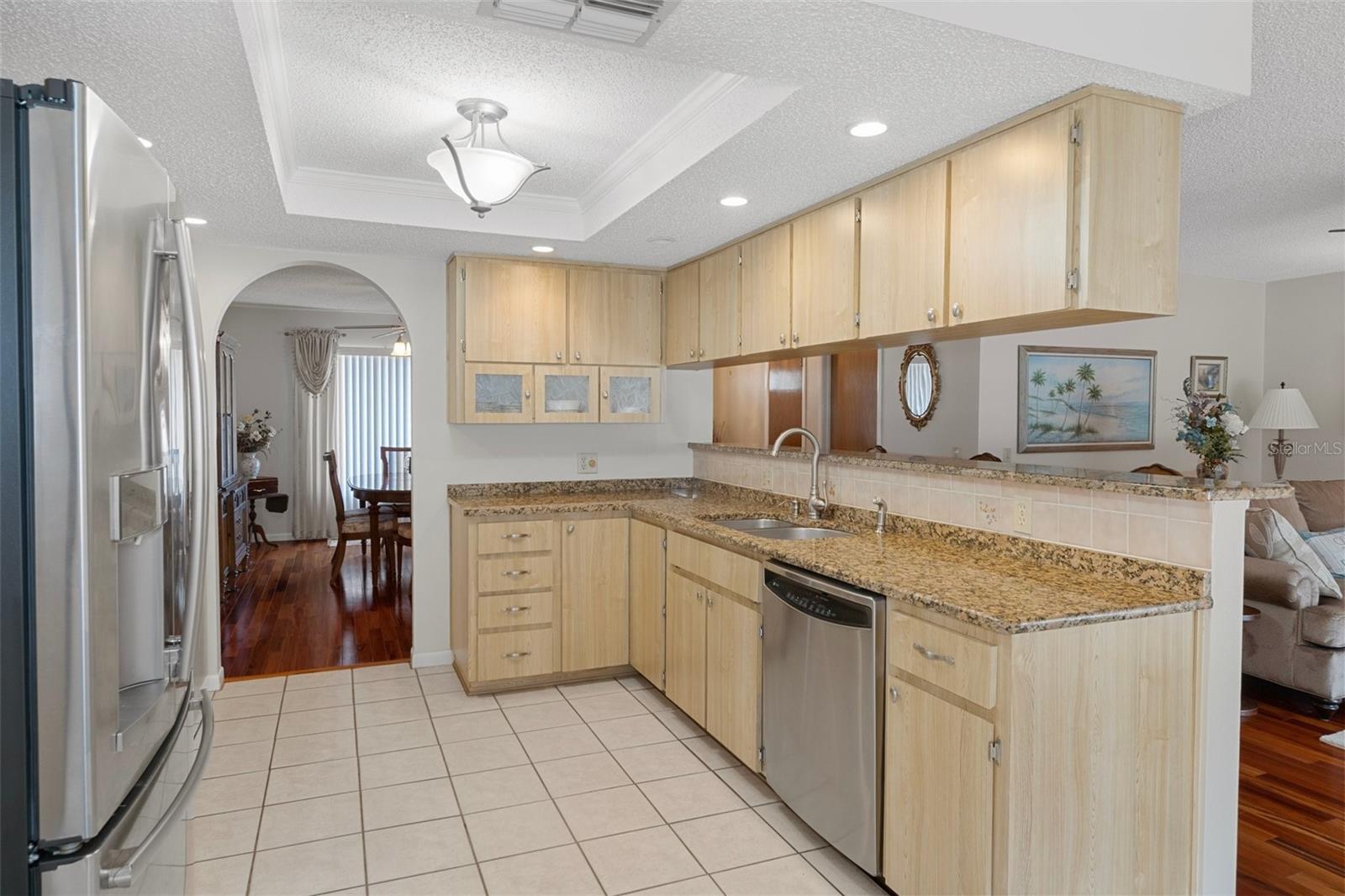 STONE COUNTERS , SPACIOUS KITCHEN