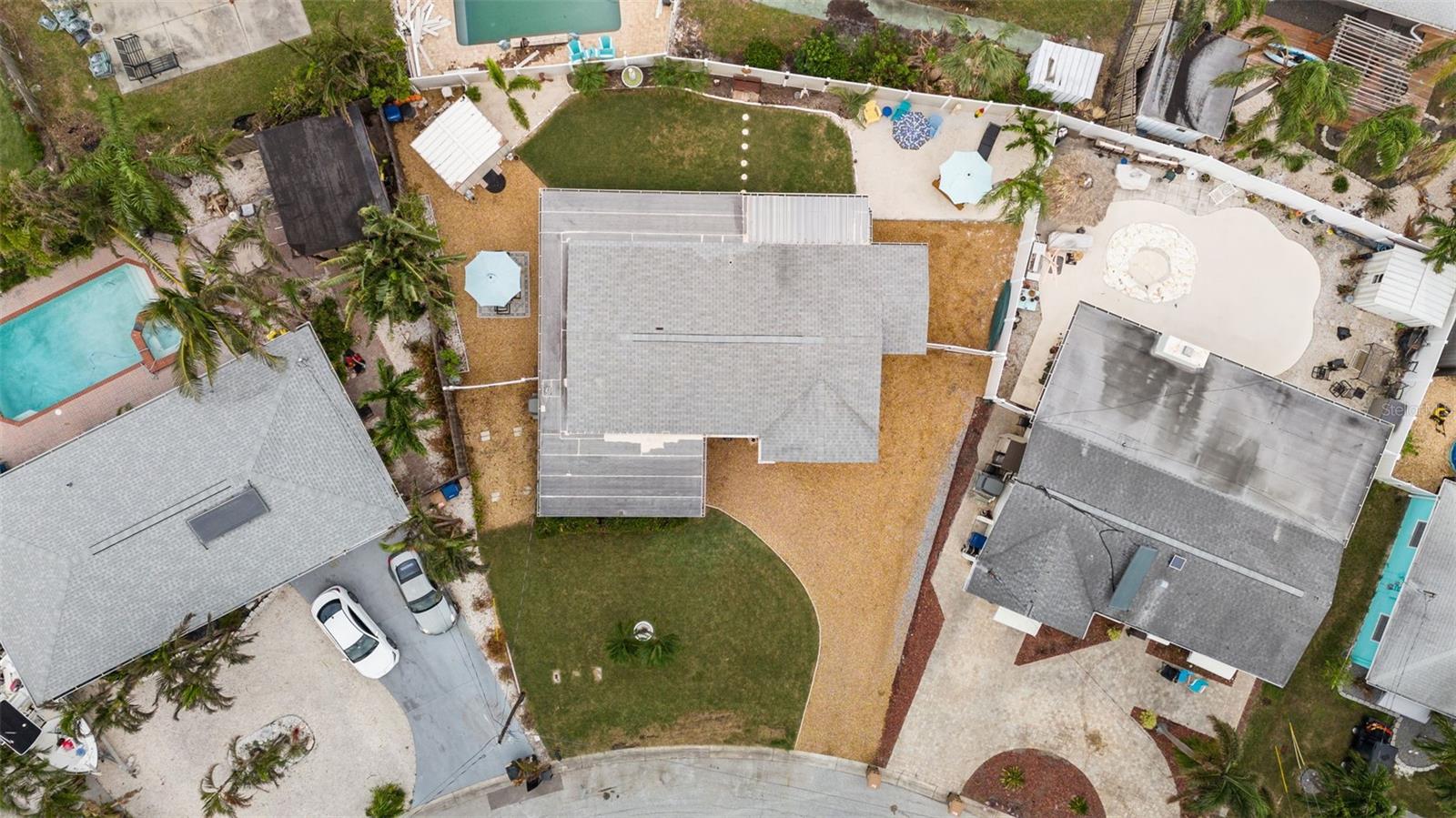 Drone view of home and lot