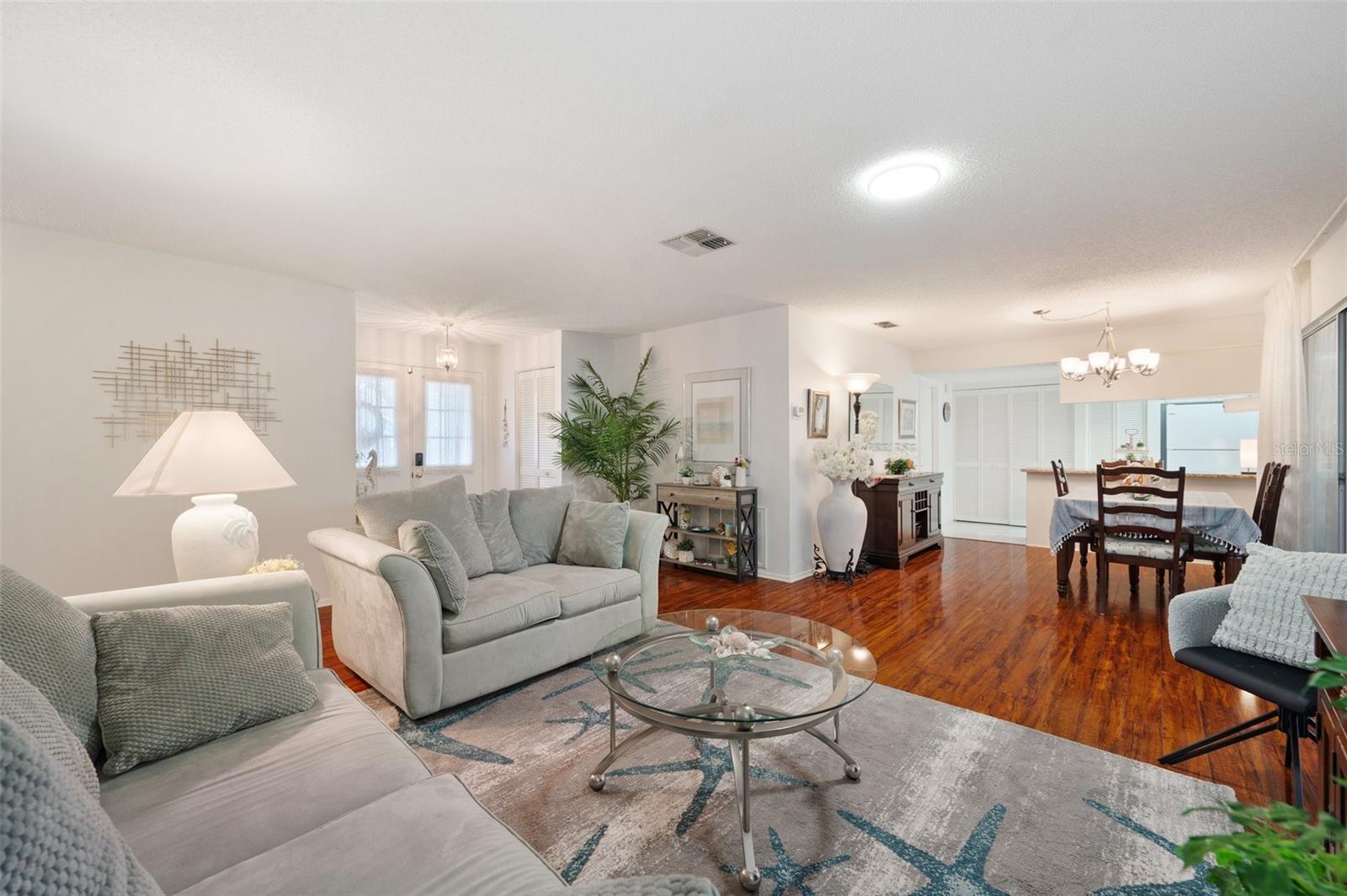 Living room adjacent to the dinning room