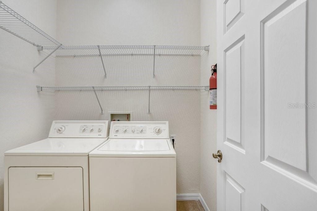 Laundry room with washer and dryer