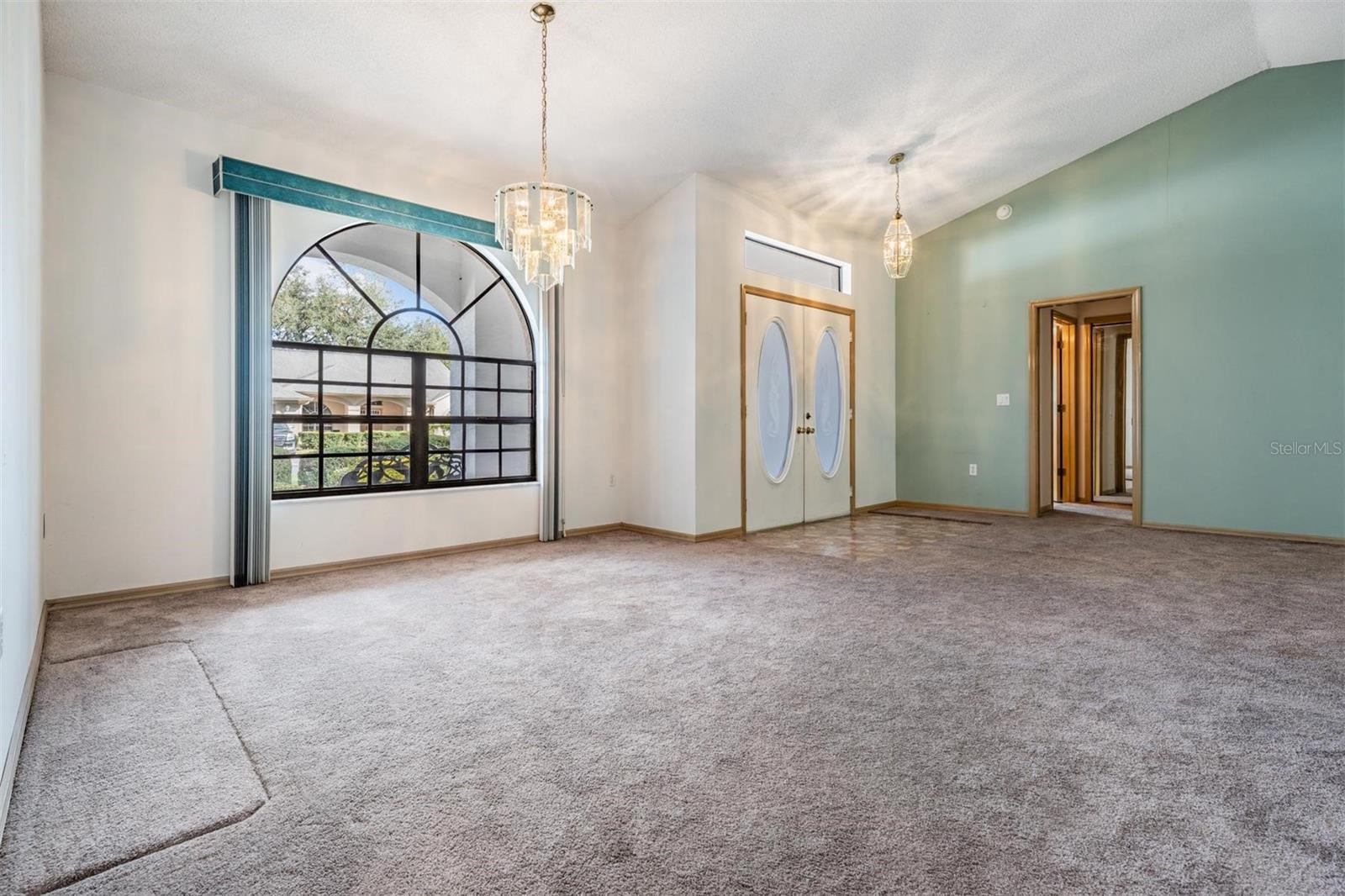 Dining area adjoins the tiled entry foyer