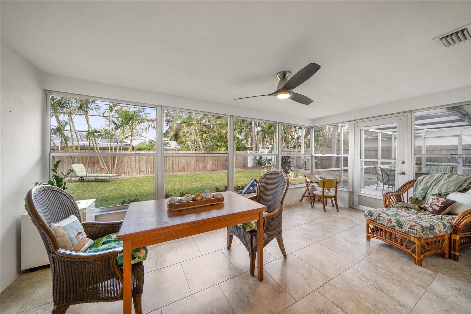 Large windows overlooking large back yard