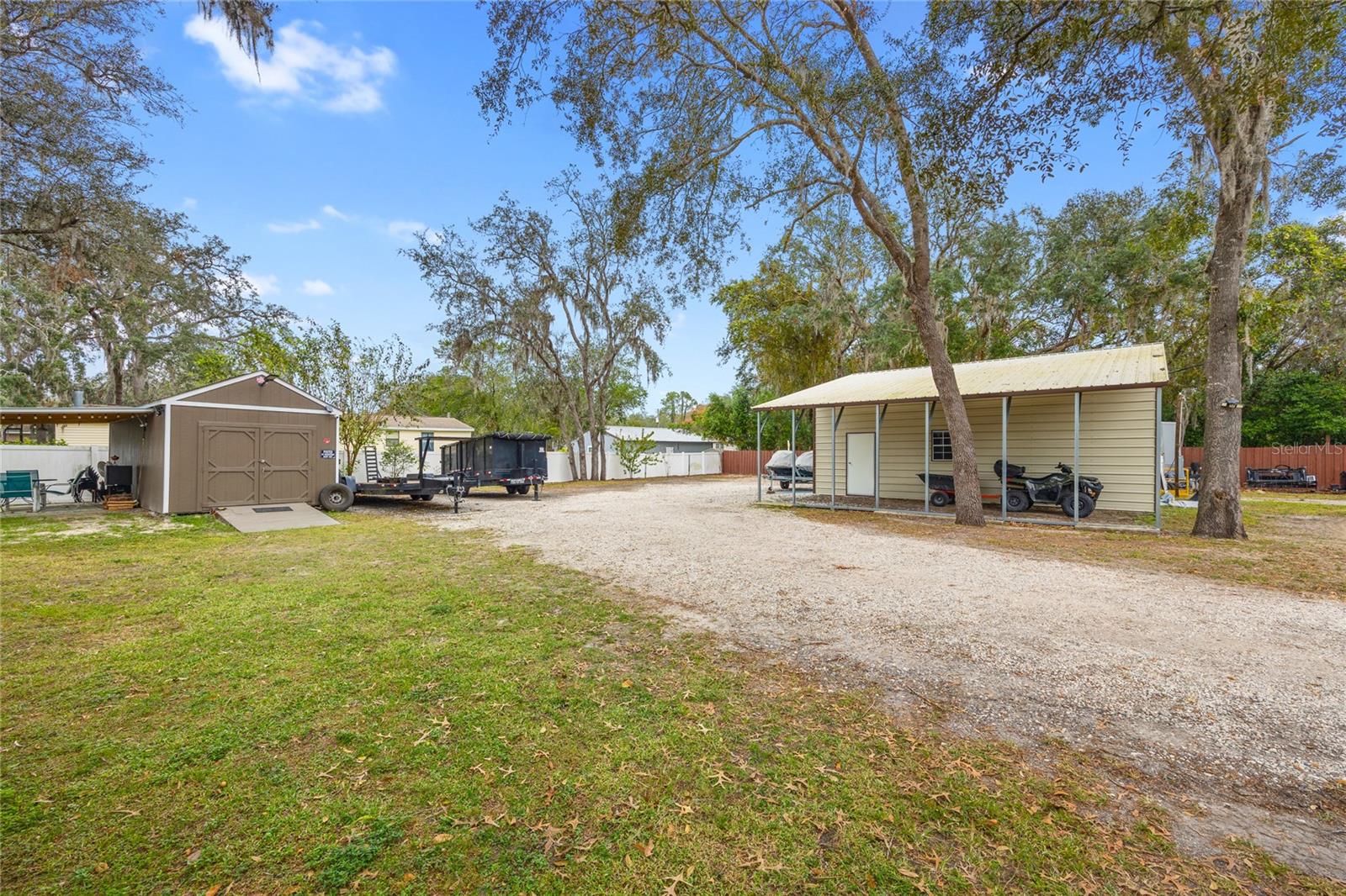 Shed & Storage w/ Porch / Detached Garage / Entry into Property