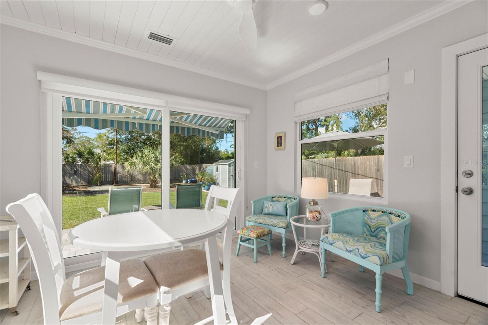 A new sliding patio door now opens to the backyard.