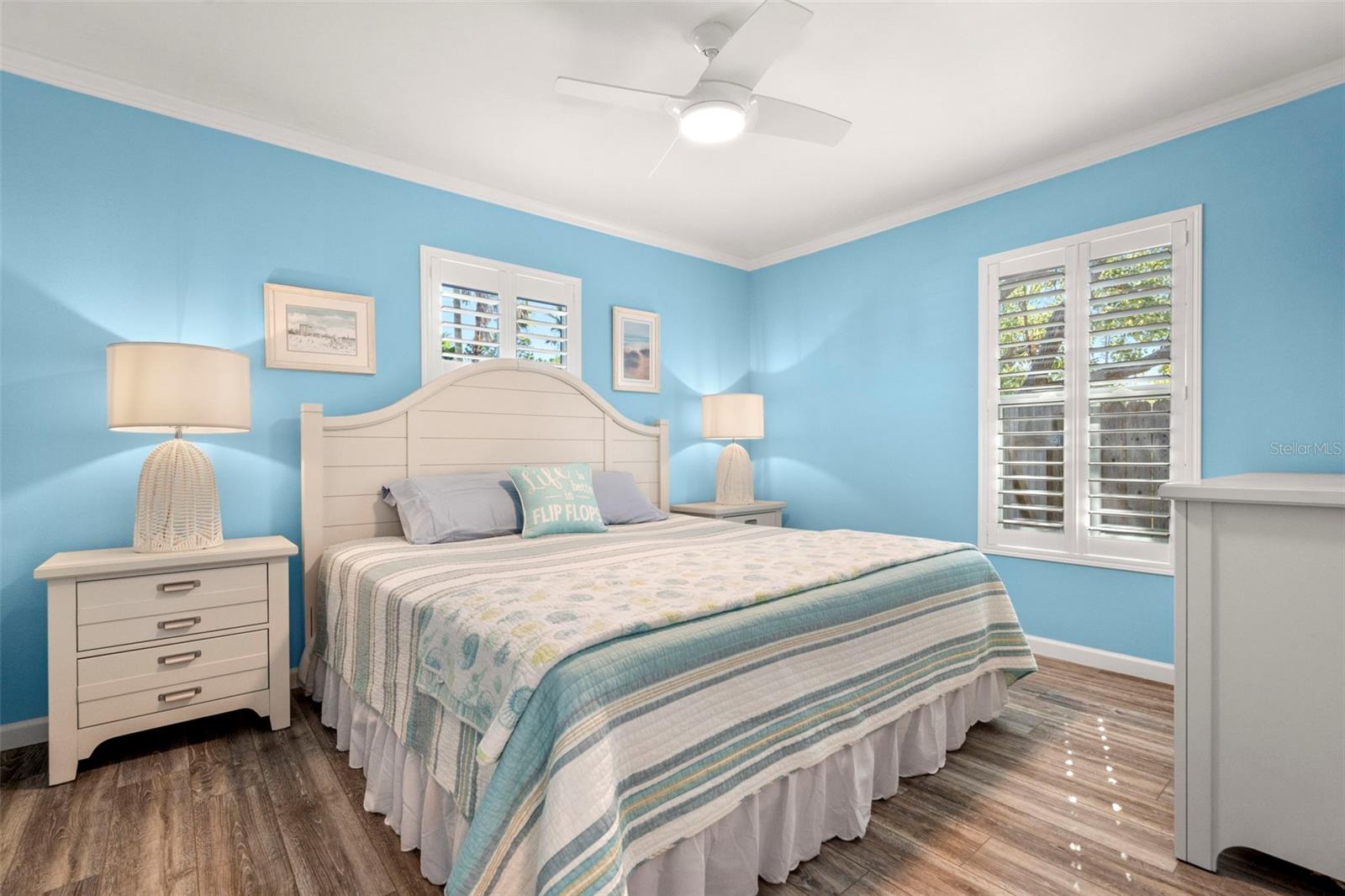 Generous sized bedroom with plantation shutters and new windows.