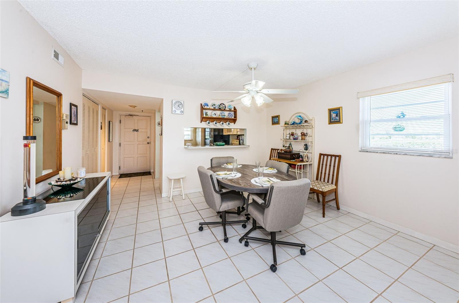 .. Front Entrance with 8 Panel Door. Kitchen to Right of Entrance Door.