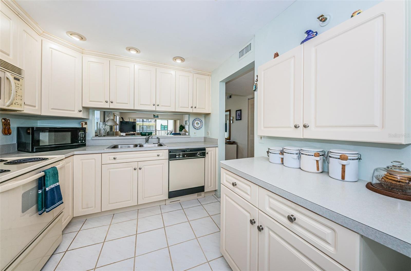 ... Loads of Cabinet Space.. Even When These Kitchens are Opened Up - There is Plenty of Room for Abundant Storage.