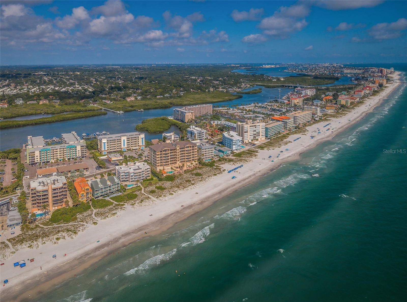 Miles of Sugar Sand Beaches Just steps away from Golden Shores  with signal-controlled crossing. Golden Shores Complex at Top of Photo on Left with Two Aqua Blue Arches..