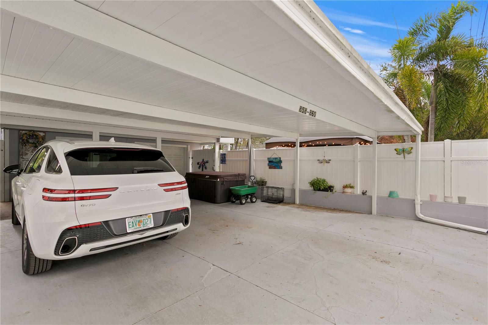 fenced in carport