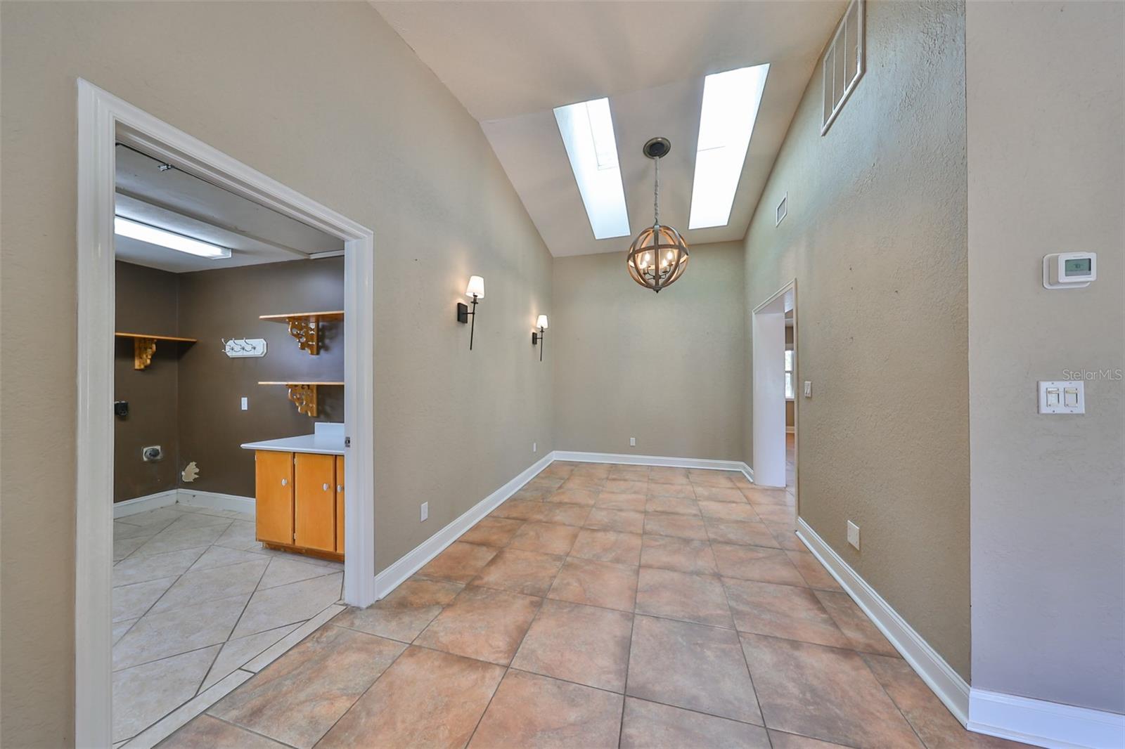 View of Dining Room and on the left is the laundry room