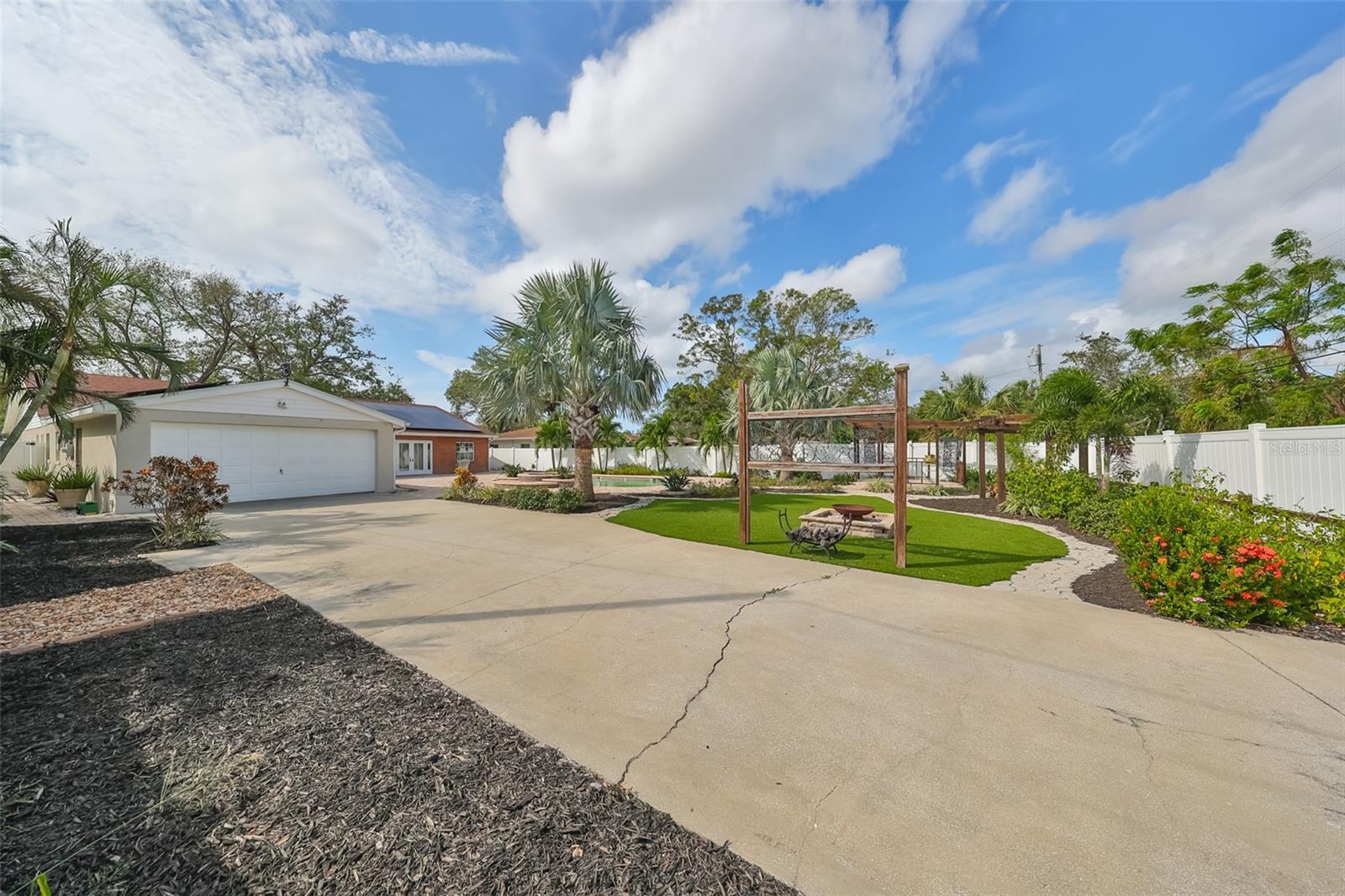 Rear access off the alley to the 2 car garage and rear garden area