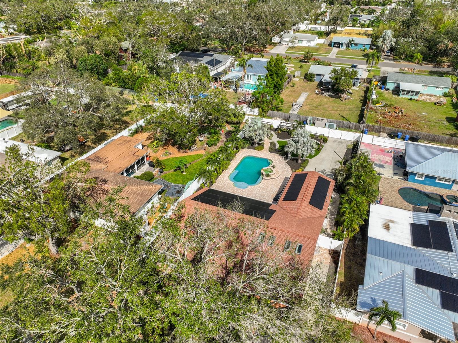 View of pool and solar panels