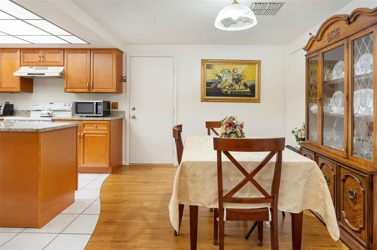 DINING AREA NEXT TO THE KITCHEN