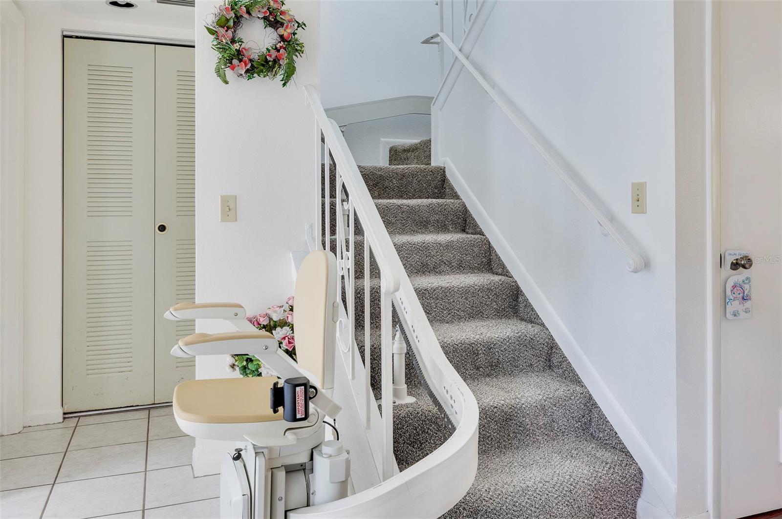 ELECTRIC STAIR CHAIR INSTALLED FOR EASY ACCESS TO THE 2ND FLOOR