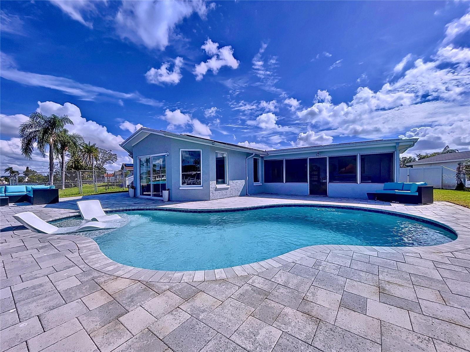 Enjoy BBQing poolside on the large deck.