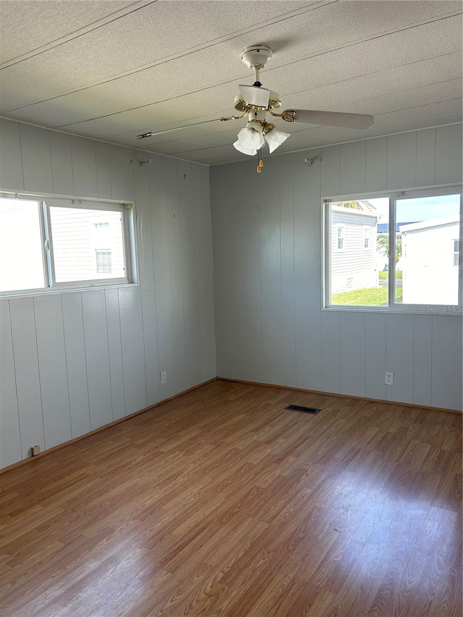 Primary bedroom with walk-in closet