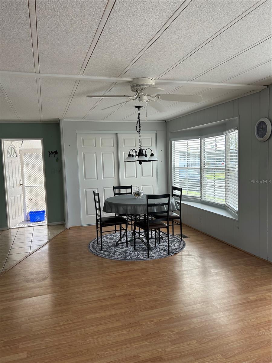 Living/Dining area with access to screened porch