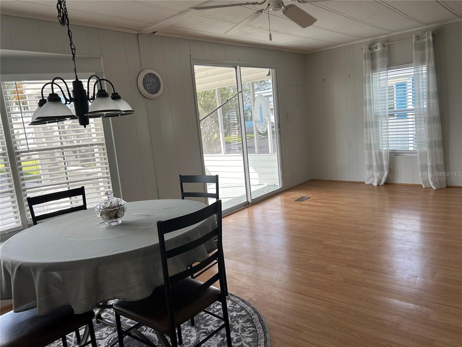 Living room with door to sunny porch